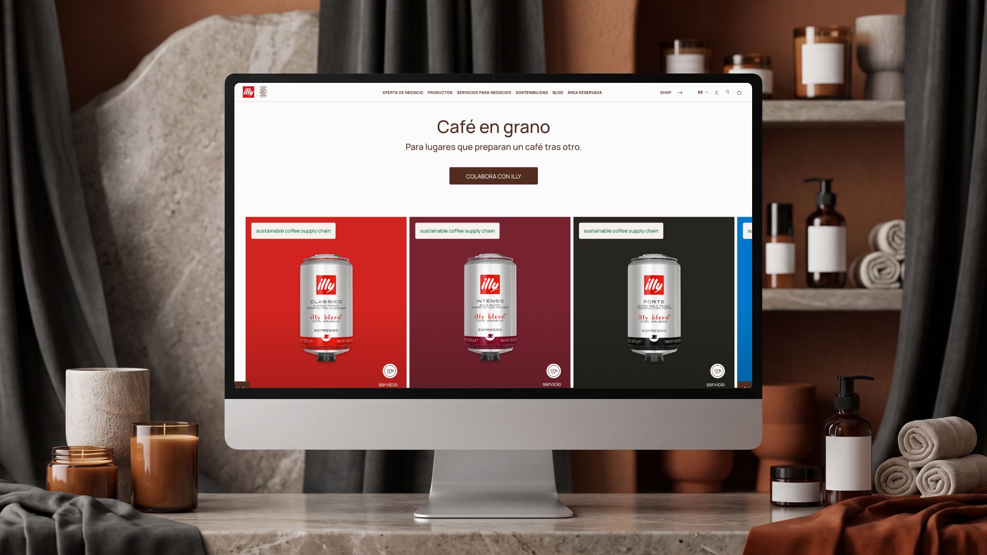 illy Spain B2B coffee catalogue displayed on a desktop monitor, showing several coffee formats for business customers.
